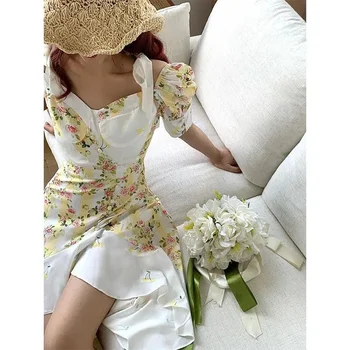 koreai Divat sárga virágos szabálytalan ruha női nyári bubble Sleeve Fodor Aszimmetrikus Strand Ruhák Vestidos